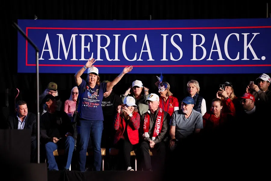 A woman gestures as people wait for US President Donald Trump, on the day Trump attends an event about the economy at the Circa Resort and Casino, in Las Vegas, Nevada, US, on 25 January 2025. (Leah Millis/Reuters)