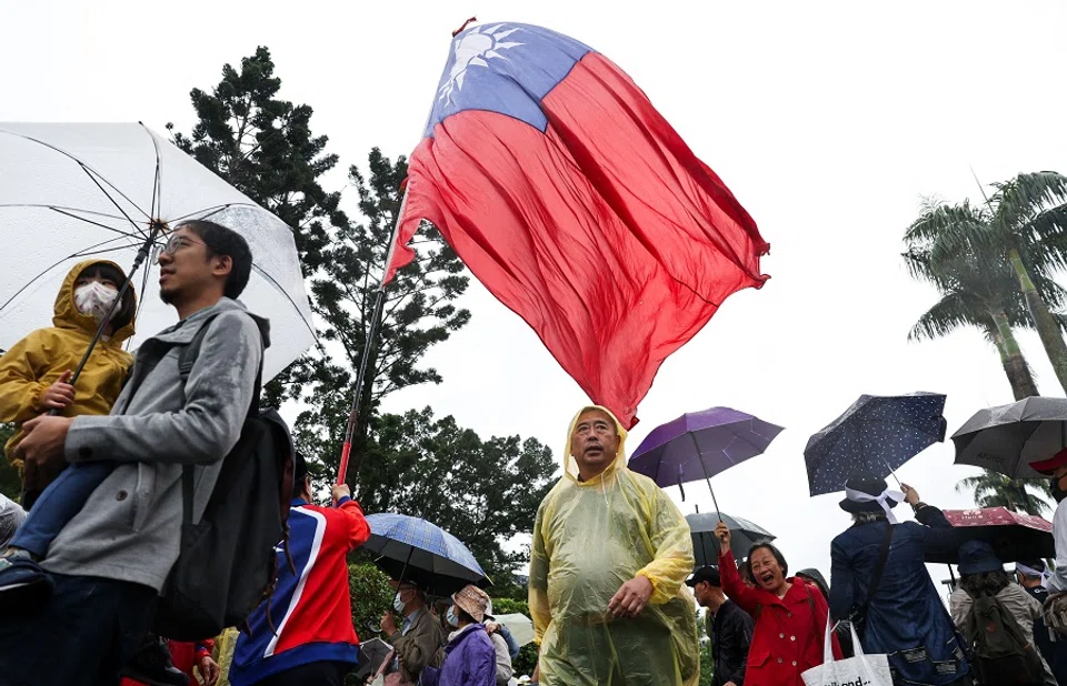 A protester waves Taiwan’s national flag during a protest against Taiwan President Lai Ching-te in Taipei on 26 April 2025. (I-Hwa Cheng/AFP)