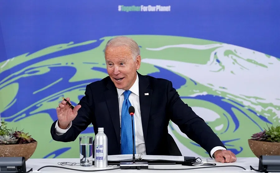 US President Joe Biden participates in a meeting on the Build Back Better World (B3W) initiative during the UN Climate Change Conference (COP26) in Glasgow, Scotland, UK, 2 November 2021. (Kevin Lamarque/Reuters)
