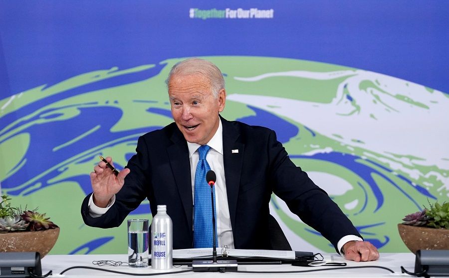 US President Joe Biden participates in a meeting on the Build Back Better World (B3W) initiative during the UN Climate Change Conference (COP26) in Glasgow, Scotland, UK, 2 November 2021. (Kevin Lamarque/Reuters)