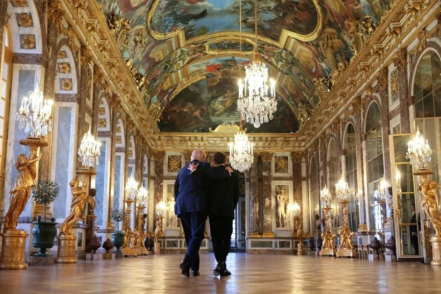 US President Donald Trump receives a tour of the Chateau de Versailles from French President Emmanuel Macron ahead of a dinner on 17 June 2026 in Versailles, France.