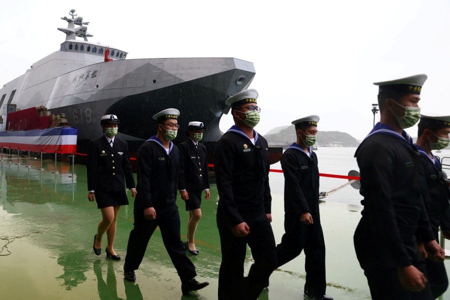 Navy officers march during the official ceremony for the new Tuo Chiang-class corvettes in Yilan, Taiwan, 15 December 2020. (Ann Wang/REUTERS)
