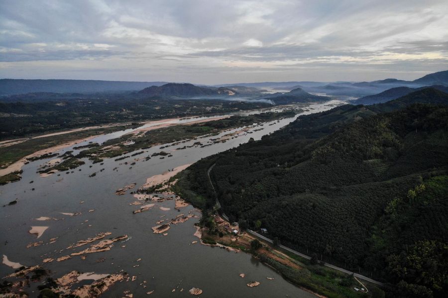 This aerial photo shows the Mekong River at Sangkhom district in the northeastern Thai province of Nong Khai, with Laos seen on the left, on October 31, 2019. (Lillian Suwanrumpha/AFP)