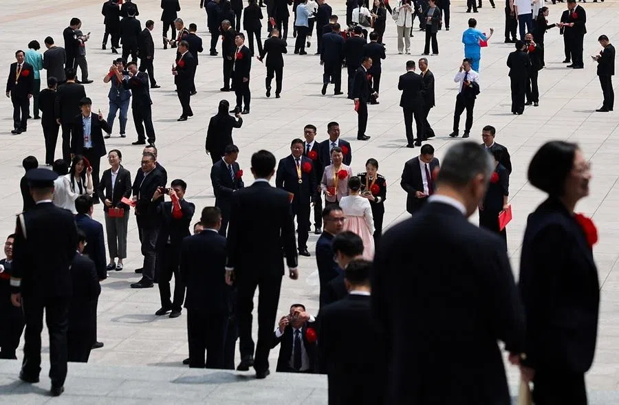 People gather in front of the Great Hall of the People after the ceremony marking the 105th anniversary of the founding of the Communist Party of China, in Beijing, China, on 1 July 2026.