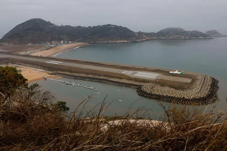 A flight arrives on the runway on Beigan Island, Matsu archipelago, Taiwan, on 17 March 2026. (Ann Wang/Reuters)