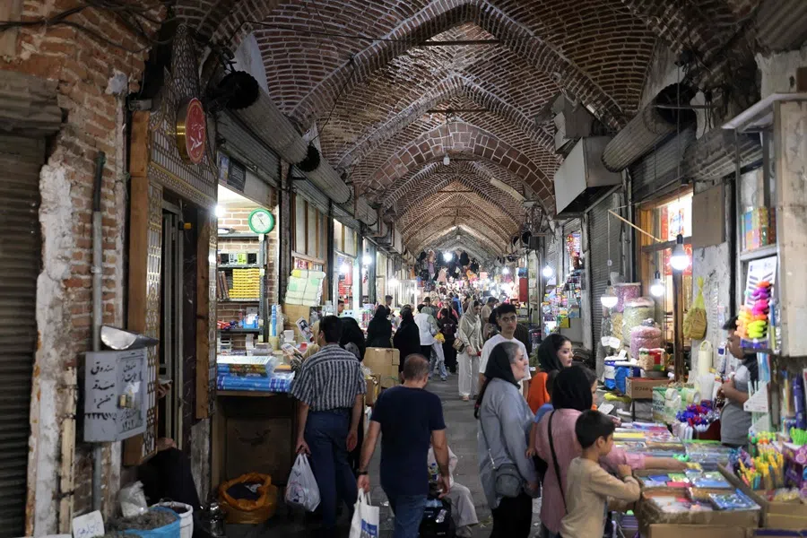 People visit the historic bazaar of Tabriz, believed to be one of the oldest bazaars in the Middle East, in northwestern Iran on 17 September 2025. (Atta Kenare/AFP)