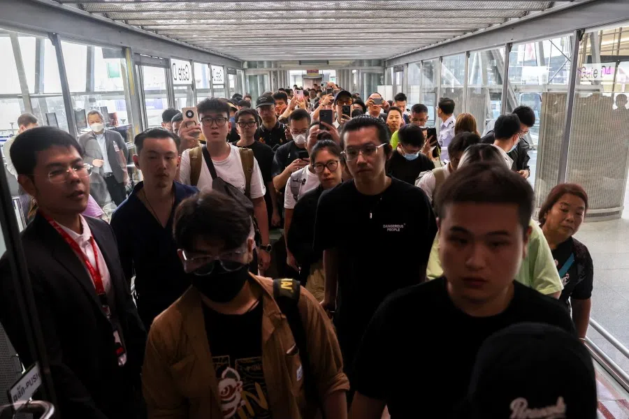Chinese tourists arrive during a welcome ceremony of the first batch of Chinese tourists under a five-month visa-free entry scheme at Bangkok's International Airport, Thailand, on 25 September 2023. (Athit Perawongmetha/Reuters)