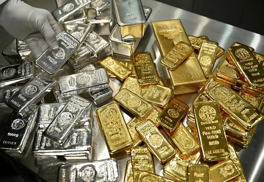 Gold and silver bars are stacked in the safe deposit boxes room of the Pro Aurum gold house in Munich, Germany, on 10 January 2025.