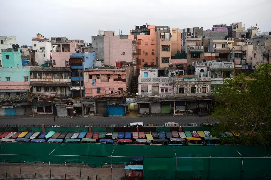 A view of an empty road is pictured during a government-imposed nationwide lockdown as a preventive measure against the spread of the Covid-19 coronavirus, in the old quarters of New Delhi on 25 April 2020. (Sajjad Hussain/AFP)
