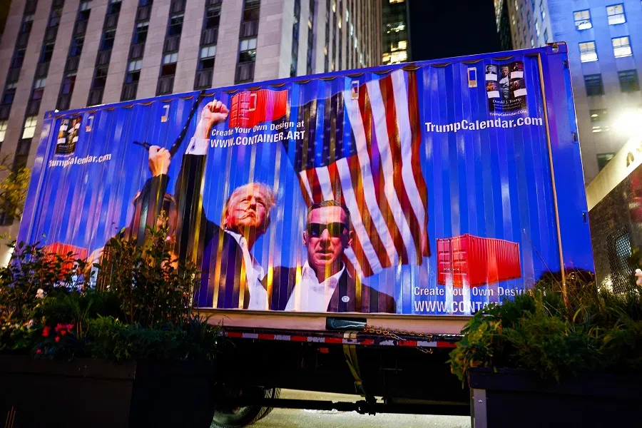 A truck displays a picture of Republican presidential nominee, former US President Donald Trump, as supporters gather at Rockefeller Center on 5 November 2024 in New York City, US.