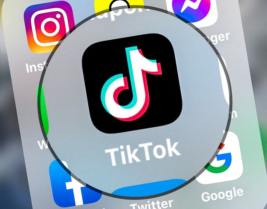 This file photo taken on 24 March 2022 shows the logo of networking application TikToK displayed on a tablet in Lille, northern France. (Denis Charlet/AFP)