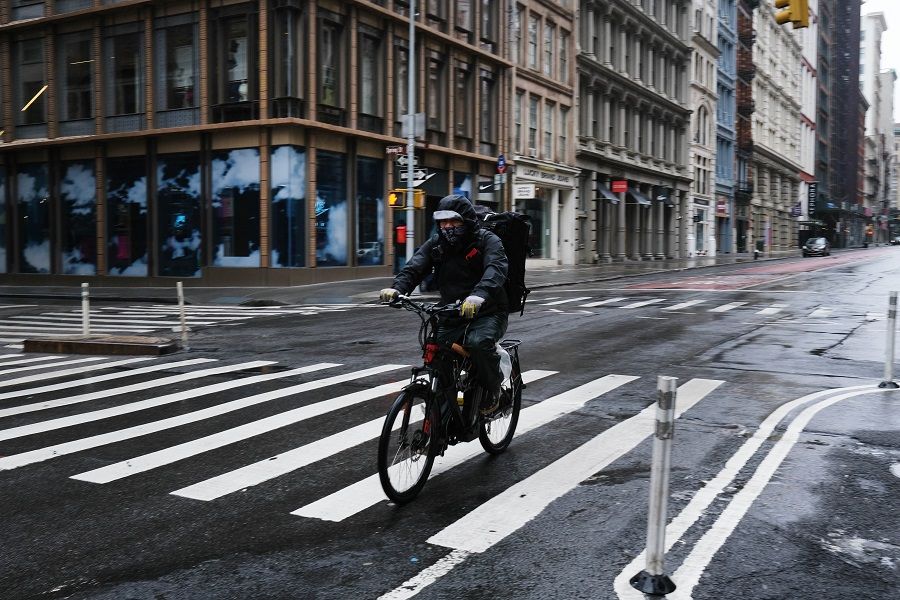 Streets stand nearly empty in the popular Manhattan shopping district of Soho on 26 April 2020 in New York City. (Spencer Platt/Getty Images/AFP)