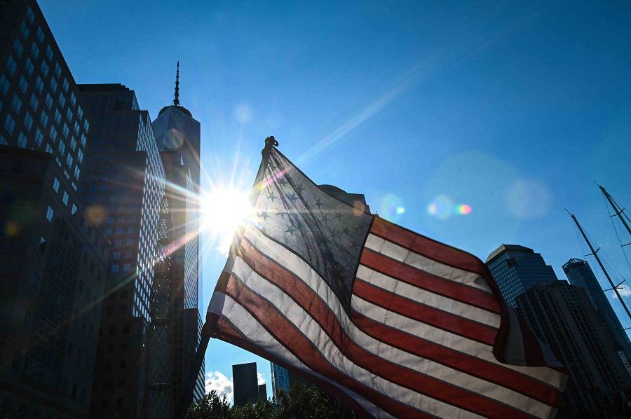 A US flag flutters in the wind near the National 9/11 Memorial & Museum on 10 September 2021 in the US. (Roberto Schmidt/AFP)