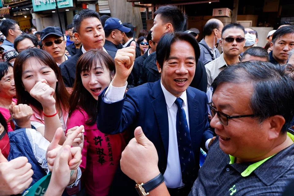 Lai Ching-te, Taiwan's vice president and the ruling Democratic Progressive Party's (DPP) presidential candidate interacts with supporters during an election campaign event in Taipei, Taiwan, 7 December 2023. (Ann Wang/Reuters)