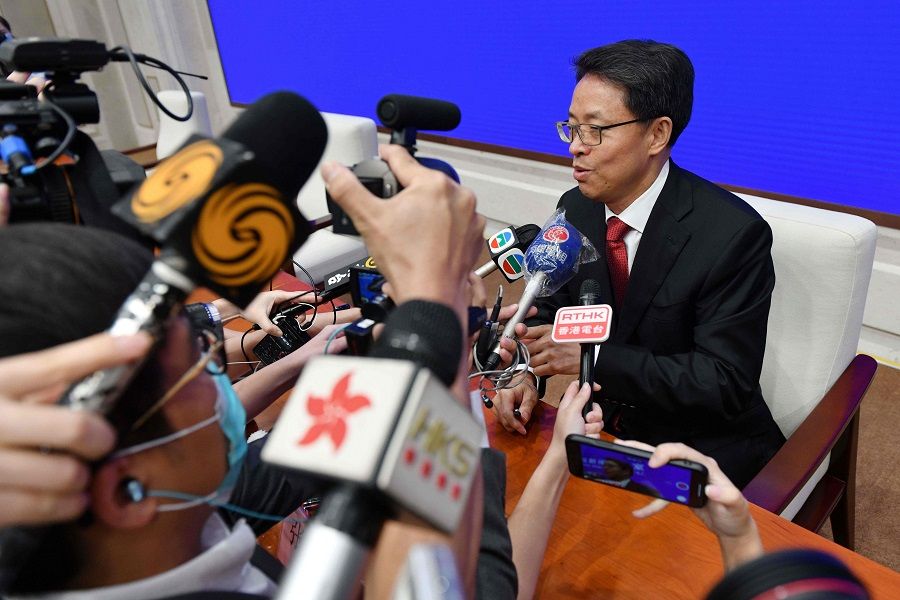 Zhang Xiaoming, executive deputy director of the Hong Kong and Macau Affairs office of the State Council, speaks to journalists at the end of a press conference about the new Hong Kong national security law in Beijing on 1 July 2020. (Greg Baker/AFP)