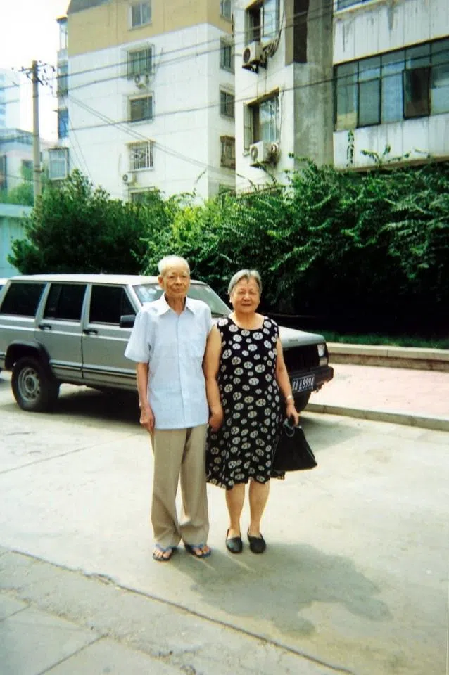 Former secretary of the CCP Taipei Municipal Working Committee Wu Ketai and his wife photographed outside their Beijing residence, 2002.
