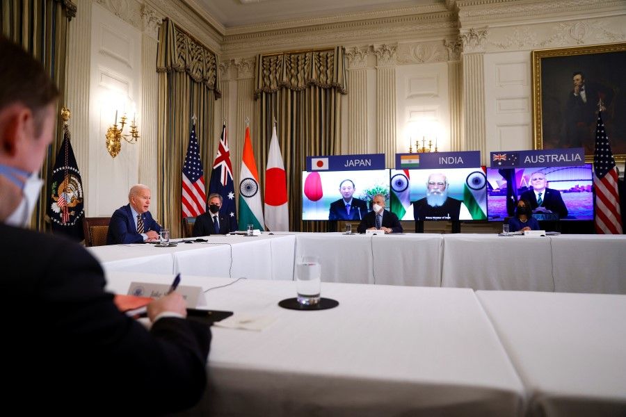 U.S. President Joe Biden and Vice President Kamala Harris, not pictured, participate beside staff and cabinet members in a virtual meeting with Asia-Pacific nation leaders at the White House in Washington, US, 12 March 2021. (Tom Brenner/Reuters)
