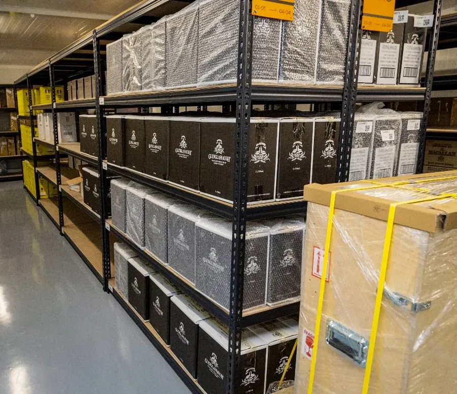Bottles of liquor that were seized and issued with prohibition of disposal orders by the police. (Singapore Police Force)