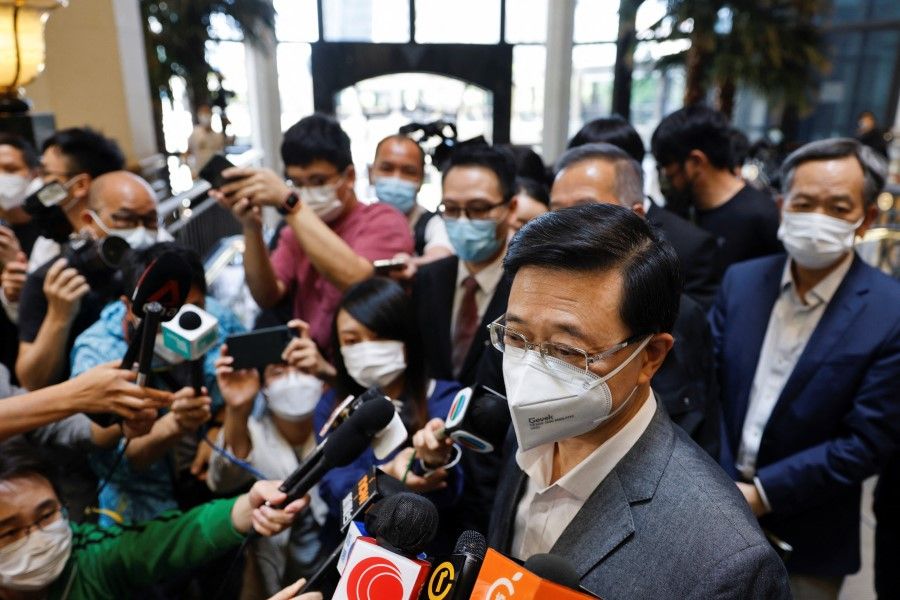 Former Hong Kong chief secretary for administration John Lee, speaks to media after Central People's Government approves his resignation, in Hong Kong, China, 8 April 2022. (Tyrone Siu/Reuters)