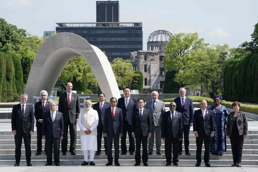 Japanese Prime Minister Fumio Kishida and G7 leaders pose for a photograph during a wreath-laying ceremony at the Peace Memorial Park in Hiroshima on 21 May 2023, on the sidelines of the G7 Summit Leaders' Meeting. (Stringer/Japan Pool/AFP)