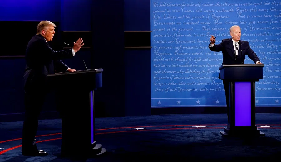 US President Donald Trump and Democratic presidential nominee Joe Biden participate in their first 2020 presidential campaign debate held on the campus of the Cleveland Clinic at Case Western Reserve University in Cleveland, Ohio, US, 29 September 2020. (Brian Snyder/Reuters)