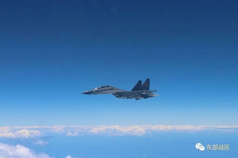 An Air Force aircraft under the Eastern Theater Command of China's People's Liberation Army (PLA) takes part in military exercises in the waters around Taiwan, in this 4 August 2022 handout released on 5 August 2022. (Eastern Theater Command/Handout via Reuters)