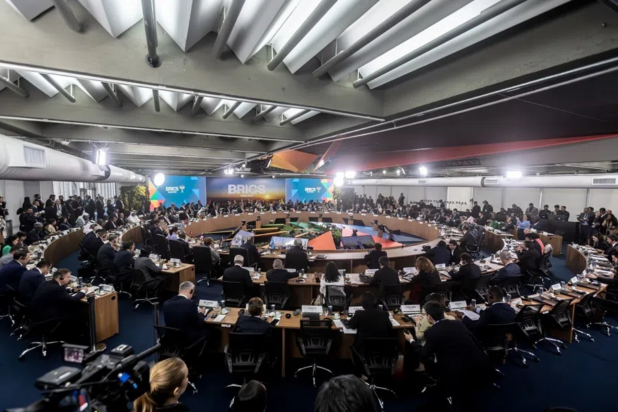 Delegates and leaders attend the opening session of the BRICS 2025 Finance Ministers and Central Bank Governors meeting at the BRICS summit in Rio de Janeiro, Brazil, on 7 July 2025.  (Dado Galdieri/Bloomberg)