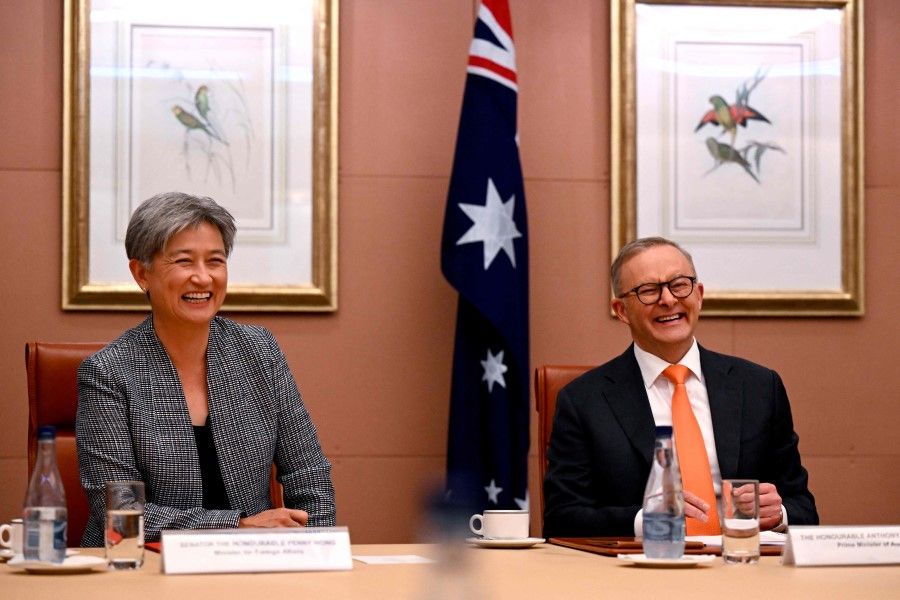 Australia's Prime Minister Anthony Albanese and Foreign Minister Penny Wong (left) attend a meeting at Parliament House in Canberra on 18 October 2022. (Lukas Coch/AFP)