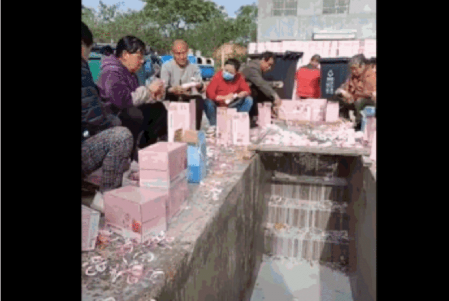 Screen capture of controversial "milk dumping" incident. (Weibo)