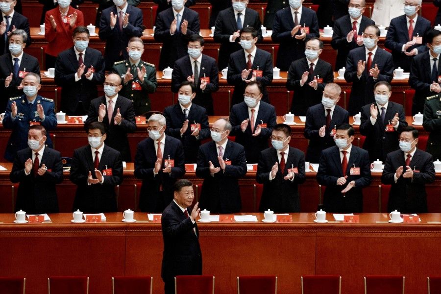 Chinese President Xi Jinping waves as he arrives for the opening ceremony of the 20th National Congress of the Communist Party of China, at the Great Hall of the People in Beijing, China, 16 October 2022. (Thomas Peter/Reuters)