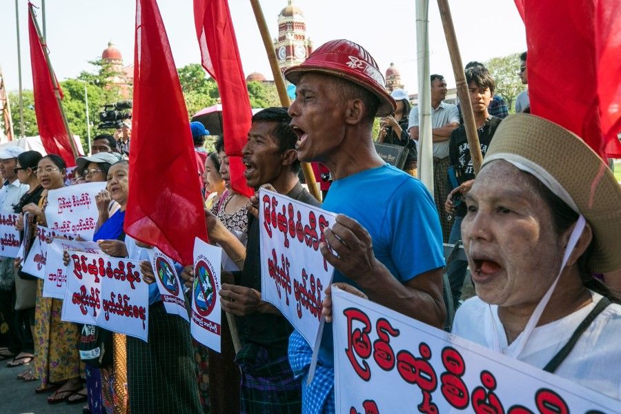 Myanmar protestors hold a rally in Yangon to protest against any reinstatement of a controversial Chinese-backed mega-dam on January 18, 2020 during the final day of Chinese President Xi Jinping's visit in Naypyidaw. The demonstrators called for the termination of the US$3.6 billion Myitsone project. The 6,000 megawatt dam was suspended in 2011 in the face of nationwide condemnation. (Sai Aung Main/AFP)
