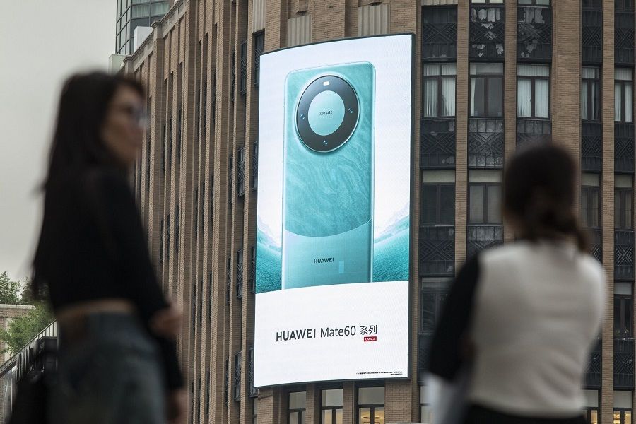 An advertisement for the Huawei Technologies Co. Mate 60 series smartphone in Shanghai, China, on 17 September 2023. (Qilai Shen/Bloomberg)