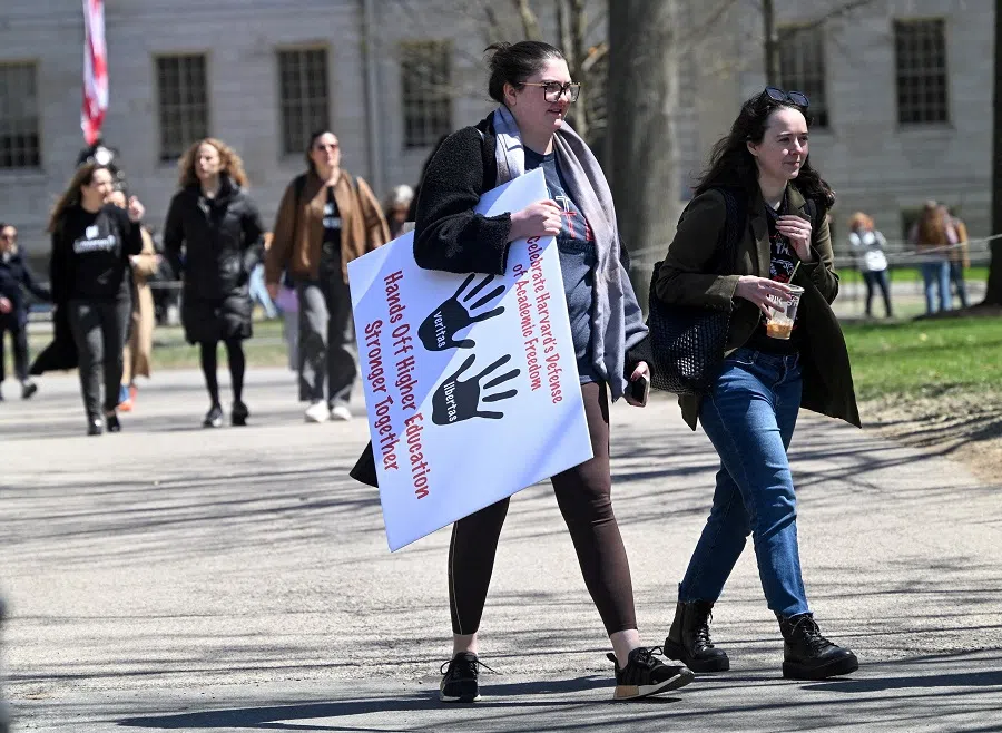 People leave a protest against US President Donald Trump’s administration and against student visas being revoked, at Harvard University in Cambridge, Massachusetts, US, on 17 April 2025.