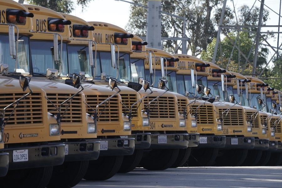 School buses at the San Diego Unified School District Transportation Department in San Diego, California, 9 July 2020. (Bing Guan/Bloomberg)