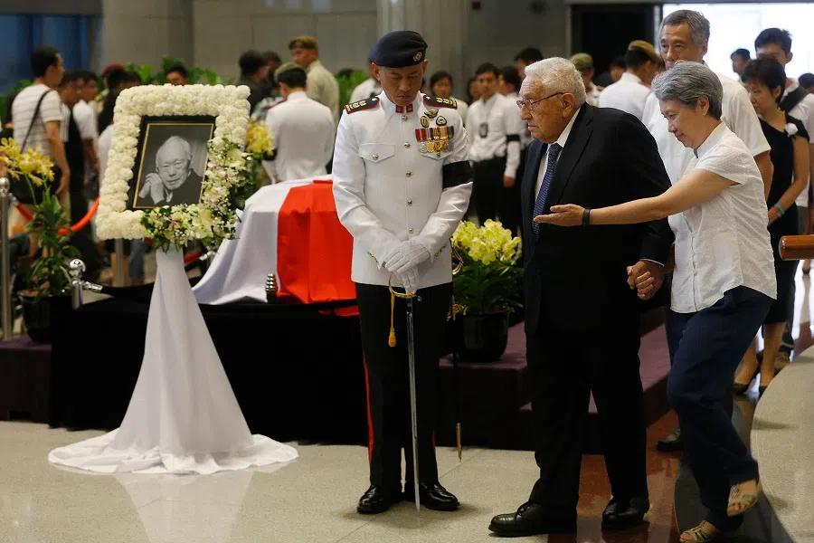Dr Henry Kissinger, former US secretary of state and Mr Lee Kuan Yew's friend of more than four decades, paying his last respects to Mr Lee at Parliament House on 8 March 2015. Accompanying him are Prime Minister Lee Hsien Loong and his wife Ho Ching. (SPH Media)