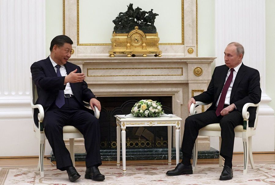 Russian President Vladimir Putin and Chinese President Xi Jinping attend a meeting at the Kremlin in Moscow, Russia, 20 March 2023. (Sputnik/Sergei Karpukhin/Pool via Reuters)