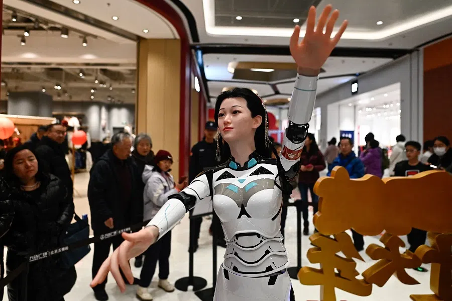 A humanoid robot is seen during the Spring Festival Science and Technology Temple Fair in Beijing, China on 31 January 2025. (Pedro Pardo/AFP)