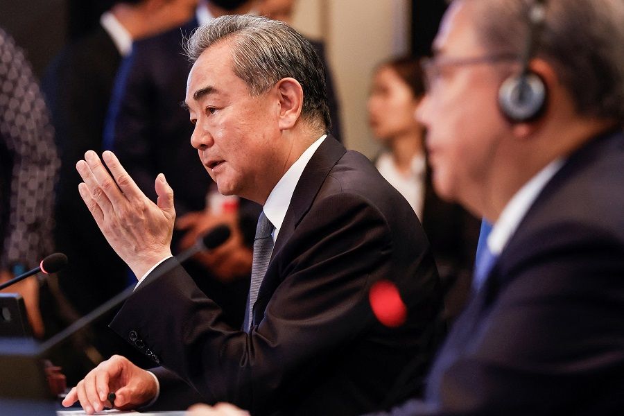 Director of the Office of the Central Commission for Foreign Affairs Wang Yi speaks as South Korea's Foreign Minister Park Jin looks on during the ASEAN Plus Three Foreign Ministers' Meeting in Jakarta, Indonesia, on 13 July 2023. (Mast Irham/Pool via Reuters)