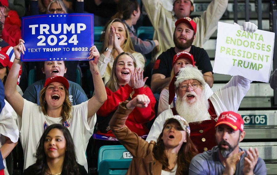 A supporter dressed as Santa cheers as Republican presidential candidate and former US President Donald Trump holds a campaign rally in Conway, South Carolina, US, on 10 February 2024. (Sam Wolfe/Reuters)