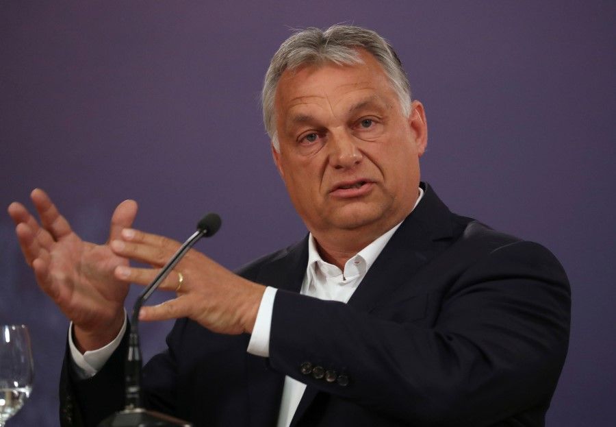 Hungarian Prime Minister Viktor Orban gestures during a news conference with Serbian President Aleksandar Vucic at the presidential building in Belgrade following the coronavirus outbreak in Serbia, 15 May 2020. (Marko Djurica/REUTERS)