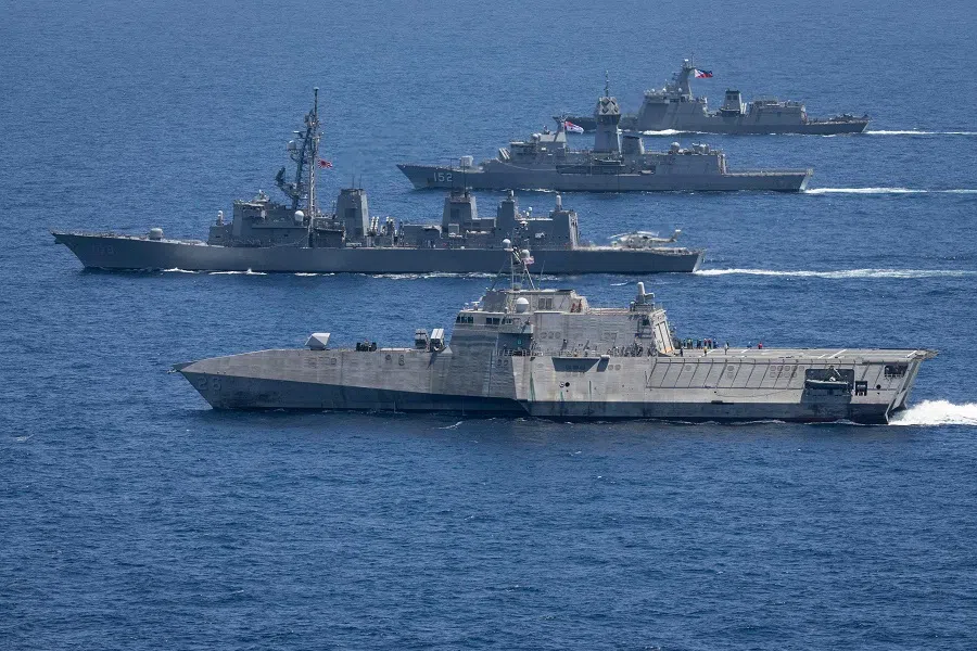 A handout photo taken on 7 April 2024 and received from the Australian Department of Defence on 8 April shows the USS Mobile, JS Akebono, HMAS Warramunga and BRP Antonio Luna sailing in formation during a multilateral maritime cooperative activity between Australia, the US, Japan and the Philippines off the coast within the Philippines Exclusive Economic Zone. (Leo Baumgartner/Australian Department of Defence/AFP)