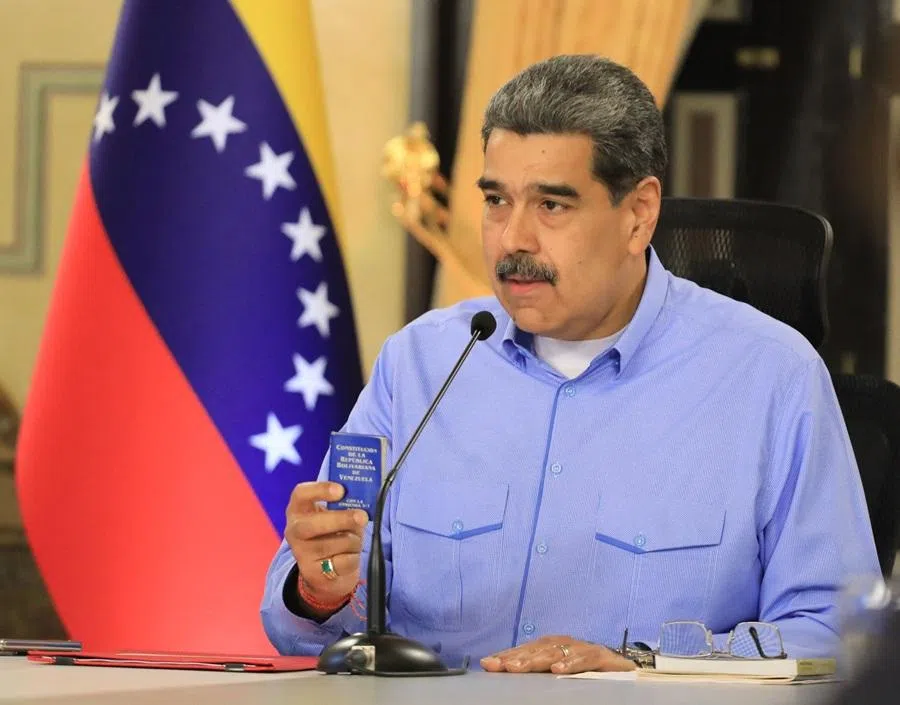 This handout picture released by the Venezuelan Presidency press office on 23 September 2025 shows Venezuela's President Nicolas Maduro speaking during a meeting with the Executive Committee of the State Council of the Nation at the Miraflores Presidential Palace in Caracas.