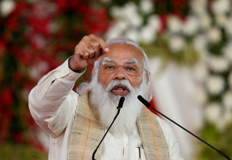 India's Prime Minister Narendra Modi addresses a gathering before flagging off the "Dandi March" or Salt March, to celebrate the 75th anniversary of India's Independence, in Ahmedabad, India, 12 March 2021. (Amit Dave/Reuters)