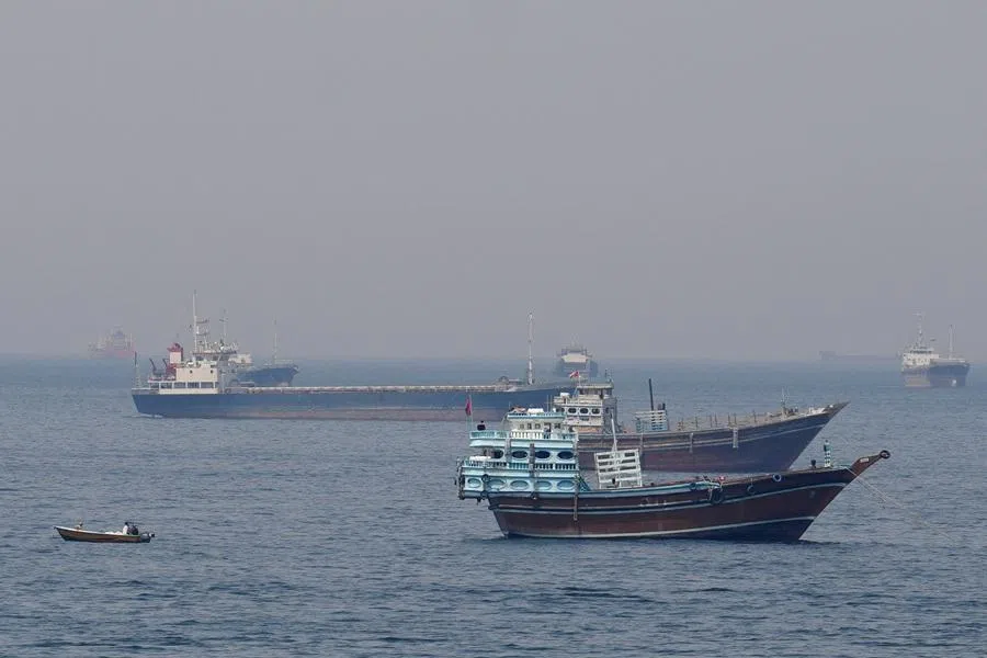 Ships and boats in the Strait of Hormuz off the coast of Musandam Governorate, Oman, 20 April 2026. (Reuters)