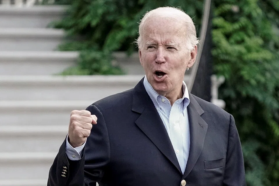 US President Joe Biden gestures to the media as he walks towards Marine One for departure to Rehoboth Beach, Delaware from the South Lawn of the White House in Washington, DC, US, 7 August 2022. (Ken Cedeno/Reuters)