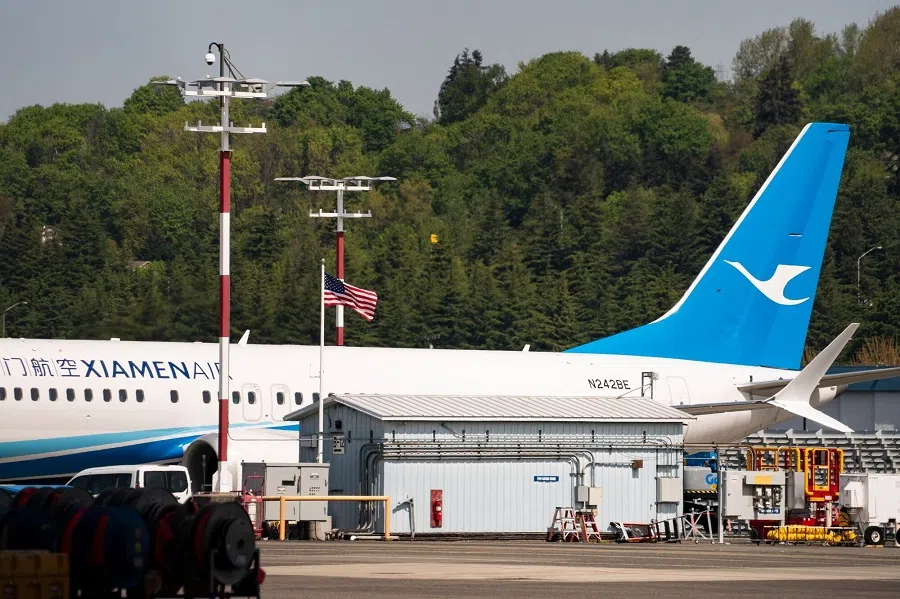 A Boeing Co. 737 Max 8 airplane, originally intended for Xiamen Airlines and recently returned to the US from China, at Boeing Field in Seattle, Washington, US, on 25 April 2025. Boeing Co. has begun flying 737 Max jets that were refused by Chinese airline customers back to the US, as the trade war between the two biggest economies escalates. (David Ryder/Bloomberg)