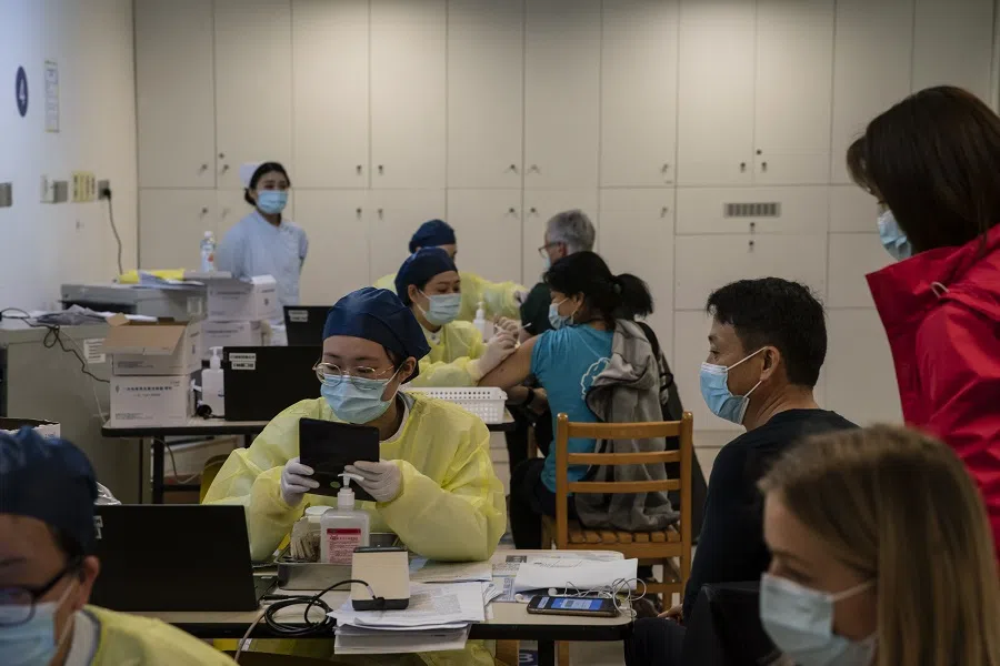A nurse administers a dose of the Sinovac Biotech Ltd. Covid-19 vaccine at a Covid-19 vaccination centre in Shanghai, China, on 3 April 2021. (Qilai Shen/Bloomberg)