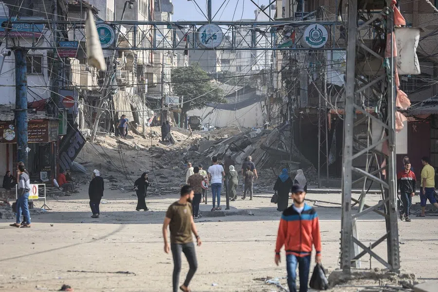 The rubble from destroyed residential buildings fills a street following Israeli airstrikes in the Shuja'iyya district east of Gaza City, Gaza, on 9 November 2023. (Ahmad Salem/Bloomberg)