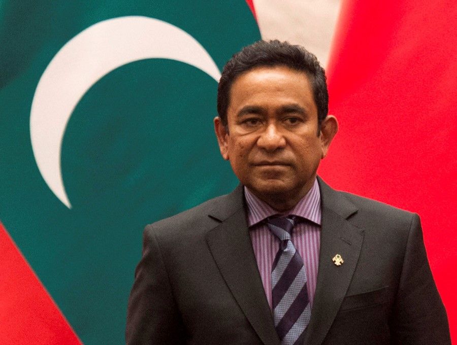 Then Maldives President Abdulla Yameen (2013-2018) attends a signing meeting at the Great Hall of the People in Beijing, China, on 7 December 2017. (Fred Dufour/Pool via Reuters)