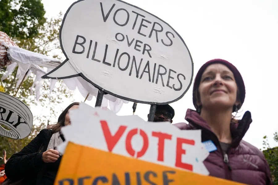 People participate in the No Kings Protest on 17 October 2026 in the Brooklyn borough of New York City ahead of the midterm elections.